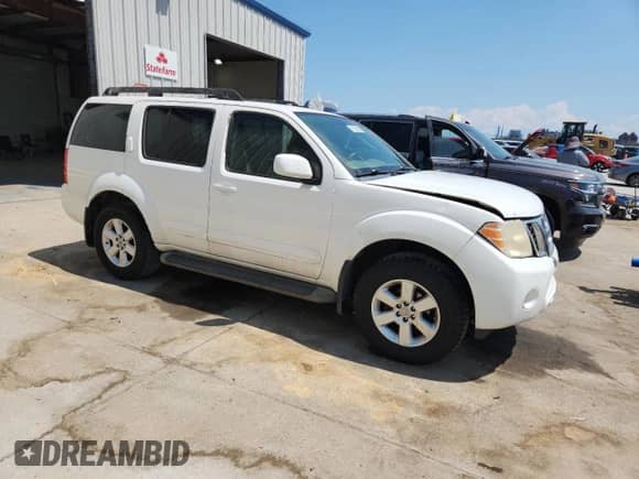 2012 Nissan Pathfinder Silver Edition with VIN 5N1AR1NNXCC621202, listed as a Copart auction lot 71036925 with 296,252 mi miles and Salvage title. Bid and sale history available at DreamBid. Image 4.