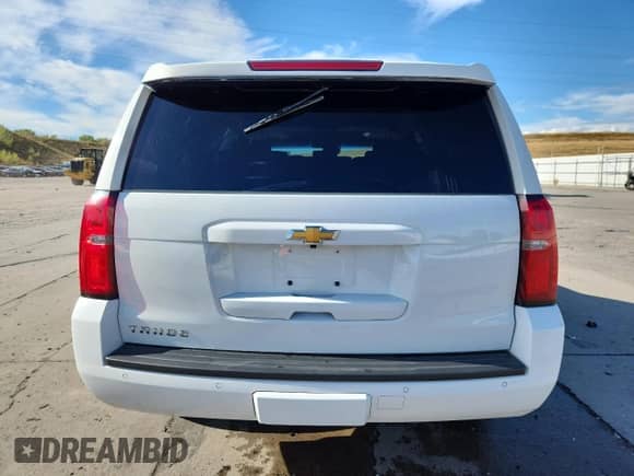 2018 Chevrolet Tahoe LT z VIN 1GNSKBKCXJR369197, wystawiony jako Copart lot #84227515 z przebiegiem 92 184 mil mil oraz Szkoda całkowita • Salvage title. Historia ofert i sprzedaży dostępna na DreamBid. Obrazek 6.