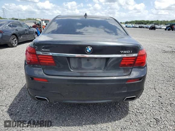 2012 BMW 7 Series 750i xDrive с VIN WBAKC6C5XCC397243, выставлен на аукционе Copart как лот 55388715 с пробегом 77 424 миль миль и Чистый • Clean title. История ставок и продаж доступна на DreamBid. Изображение 6.