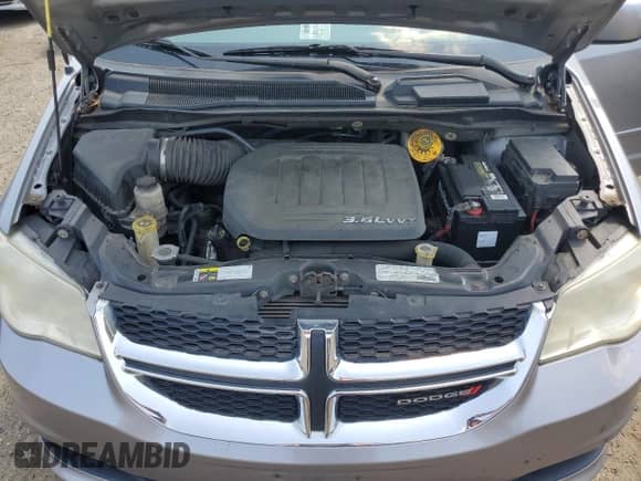 2014 Dodge Grand Caravan SXT with VIN 2C4RDGCG2ER155644, listed as a Copart auction lot 67682205 with 158,834 mi miles and Clean title. Bid and sale history available at DreamBid. Image 12.
