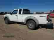 2002 Nissan Frontier XE z VIN 1N6ED26T52C366879, wystawiony jako Copart lot #67726024 z przebiegiem 141 068 mil mil oraz Szkoda całkowita • Salvage title. Historia ofert i sprzedaży dostępna na DreamBid. Obrazek 2.