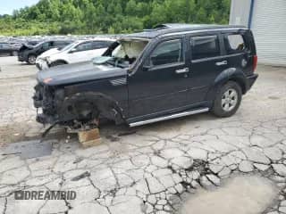2011 Dodge Nitro Heat with VIN 1D4PU4GXXBW501574, listed as a Copart auction lot 57790205 with 71,745 mi miles and Salvage title. Bid and sale history available at DreamBid. Image 1.