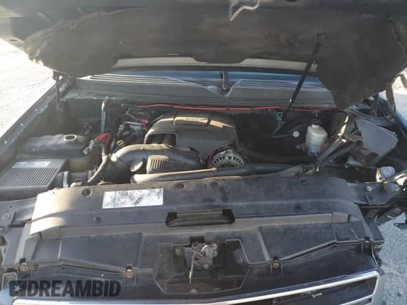 2008 Chevrolet Suburban LTZ with VIN 3GNFC16068G166360, listed as a Copart auction lot 71179695 with 245,635 mi miles and Salvage title. Bid and sale history available at DreamBid. Image 12.