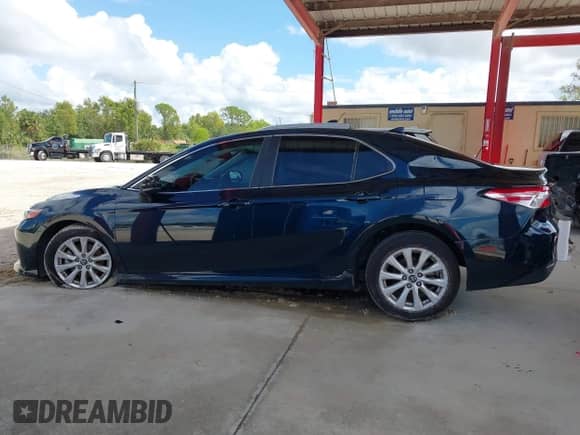 2019 Toyota Camry SE z VIN 4T1B11HKXKU683964, wystawiony jako IAAI lot #43364127 z przebiegiem 76 775 mil mil oraz . Historia ofert i sprzedaży dostępna na DreamBid. Obrazek 14.