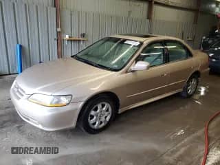 2002 Honda Accord EX with VIN 1HGCG566X2A105306, listed as a Copart auction lot 82111125 with 146,225 mi miles and Salvage title. Bid and sale history available at DreamBid. Image 1.
