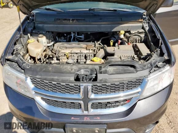 2017 Dodge Journey SXT with VIN 3C4PDCBB9HT507982, listed as a Copart auction lot 82129035 with 117,013 mi miles and Salvage title. Bid and sale history available at DreamBid. Image 12.