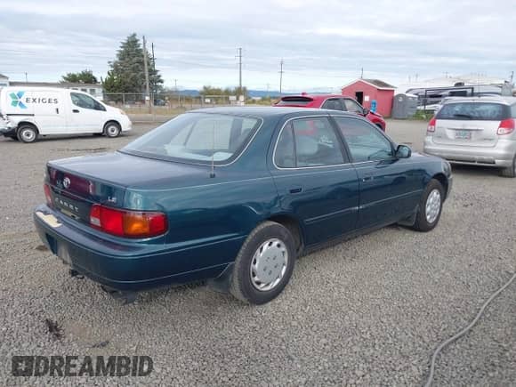 1996 Toyota Camry DX with VIN 4T1BG12K8TU777026, listed as a IAAI auction lot 43000116 with 222,952 mi miles and . Bid and sale history available at DreamBid. Image 4.