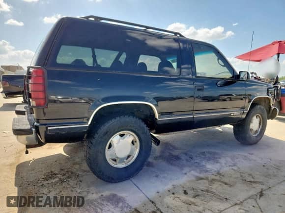 1996 Chevrolet Tahoe с VIN 3GNEK18R6TG151604, выставлен на аукционе Copart как лот 61547005 с пробегом 306 287 миль миль и Чистый • Clean title. История ставок и продаж доступна на DreamBid. Изображение 3.