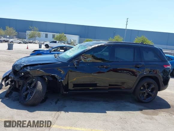 2023 Jeep Grand Cherokee Altitude with VIN 1C4RJHAG3PC519597, listed as a IAAI auction lot 42706908 with 45,848 mi miles and . Bid and sale history available at DreamBid. Image 14.