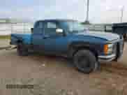 1991 GMC Sierra 1500 SLT z VIN 2GTEK19Z4M1542137, wystawiony jako Copart lot #68024074 z przebiegiem 347 281 mil mil oraz Szkoda całkowita • Salvage title. Historia ofert i sprzedaży dostępna na DreamBid. Obrazek 4.