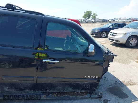 2007 Chevrolet Tahoe LTZ z VIN 1GNFK13077R331449, wystawiony jako IAAI lot #42848077 z przebiegiem Nie podano mil oraz . Historia ofert i sprzedaży dostępna na DreamBid. Obrazek 13.