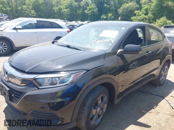 2020 Honda HR-V LX z VIN 3CZRU6H30LM739135, wystawiony jako IAAI lot #42394329 z przebiegiem 102 112 mil mil oraz . Historia ofert i sprzedaży dostępna na DreamBid. Obrazek 2.