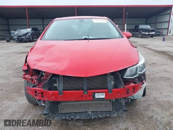 2018 Chevrolet Cruze LS z VIN 1G1BC5SMXJ7100220, wystawiony jako IAAI lot #42800342 z przebiegiem 69 739 mil mil oraz . Historia ofert i sprzedaży dostępna na DreamBid. Obrazek 13.