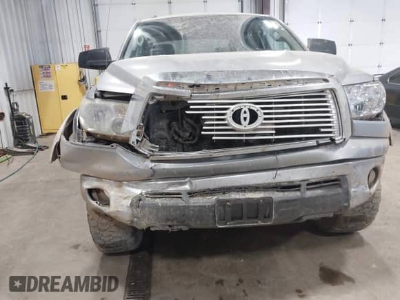 2013 Toyota Tundra Limited with VIN 5TFHW5F12DX289443, listed as a IAAI auction lot 42989623 with 195,739 mi miles and . Bid and sale history available at DreamBid. Image 6.