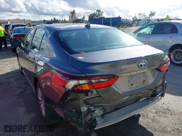 2023 Toyota Camry Hybrid LE with VIN 4T1C31AKXPU611291, listed as a IAAI auction lot 43454380 with 48,339 mi miles and . Bid and sale history available at DreamBid. Image 3.