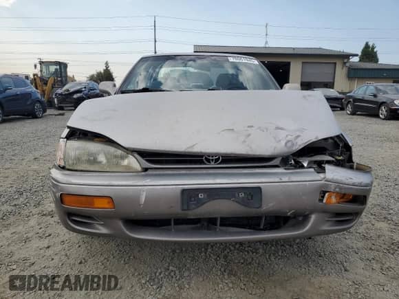 1996 Toyota Camry DX z VIN JT2BG12K9T0371115, wystawiony jako Copart lot #70061945 z przebiegiem 274 613 mil mil oraz Szkoda całkowita • Salvage title. Historia ofert i sprzedaży dostępna na DreamBid. Obrazek 5.