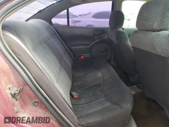 2004 Pontiac Grand Am SE with VIN 1G2NE52F44M563674, listed as a Copart auction lot 56692715 with 197,843 mi miles and Salvage title. Bid and sale history available at DreamBid. Image 10.