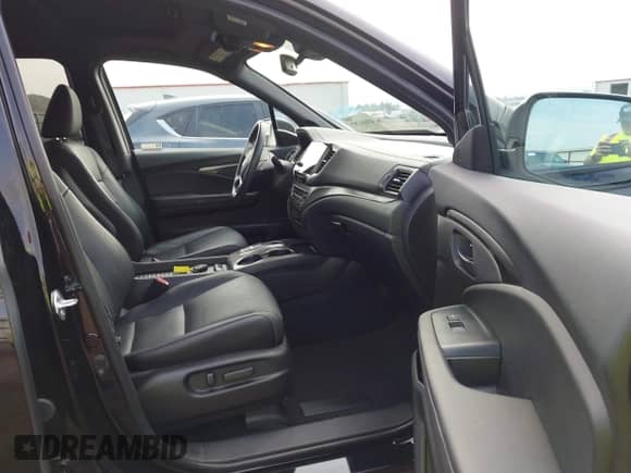 2022 Honda Passport EX-L with VIN 5FNYF8H59NB024628, listed as a IAAI auction lot 43084397 with 33,671 mi miles and . Bid and sale history available at DreamBid. Image 5.