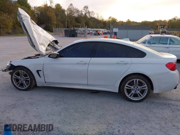 2015 BMW 4 Series 428i xDrive с VIN WBA4C9C57FD330866, выставлен на аукционе IAAI как лот 40574326 с пробегом 123 726 миль миль и . История ставок и продаж доступна на DreamBid. Изображение 14.