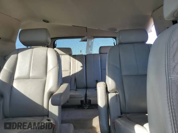 2007 Chevrolet Tahoe LS with VIN 1GNFK13027R320164, listed as a Copart auction lot 76479034 with 214,465 mi miles and Salvage title. Bid and sale history available at DreamBid. Image 10.