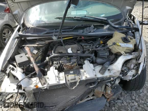 2002 Chevrolet Venture с VIN 1GNDV03E02D185812, выставлен на аукционе Copart как лот 70580084 с пробегом Не указан миль и Списание • Salvage title. История ставок и продаж доступна на DreamBid. Изображение 11.
