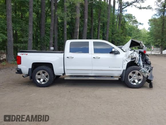 2017 Chevrolet Silverado 1500 LTZ z VIN 3GCUKSEC6HG340416, wystawiony jako IAAI lot #42812522 z przebiegiem 152 028 mil mil oraz . Historia ofert i sprzedaży dostępna na DreamBid. Obrazek 13.