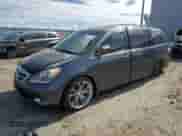 2005 Honda Odyssey Touring с VIN 5FNRL38835B039040, выставлен на аукционе Copart как лот 82335395 с пробегом 188 854 миль миль и Списание • Salvage title. История ставок и продаж доступна на DreamBid. Изображение 1.