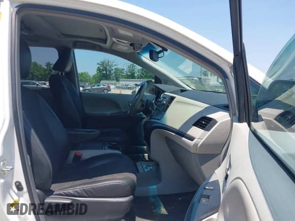 2012 Toyota Sienna SE with VIN 5TDXK3DC1CS186020, listed as a IAAI auction lot 42471455 with 215,048 mi miles and . Bid and sale history available at DreamBid. Image 5.