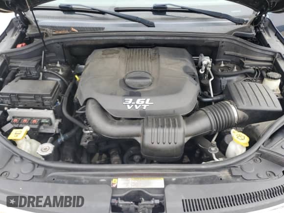 2012 Jeep Grand Cherokee Limited z VIN 1C4RJFBG8CC300891, wystawiony jako Copart lot #84041155 z przebiegiem 141 239 mil mil oraz Czysty tytuł • Clean title. Historia ofert i sprzedaży dostępna na DreamBid. Obrazek 12.