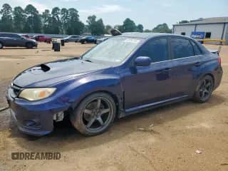 2012 Subaru WRX WRX Premium with VIN JF1GV7F6XCG031214, listed as a Copart auction lot 69784735 with 121,170 mi miles and Salvage title. Bid and sale history available at DreamBid. Image 1.