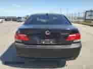 2007 BMW 7 Series 750i z VIN WBAHL83547DT09809, wystawiony jako Copart lot #54817145 z przebiegiem 209 806 mil mil oraz Szkoda całkowita • Salvage title. Historia ofert i sprzedaży dostępna na DreamBid. Obrazek 6.