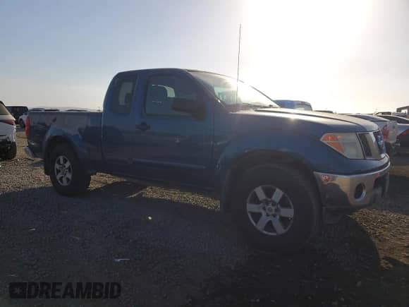 2005 Nissan Frontier SE with VIN 1N6AD06U35C433222, listed as a Copart auction lot 82253905 with 210,882 mi miles and Salvage title. Bid and sale history available at DreamBid. Image 4.