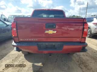 2018 Chevrolet Silverado 1500 LT z VIN 3GCUKREC4JG155439, wystawiony jako Copart lot #86126245 z przebiegiem 125 987 mil mil oraz Szkoda całkowita • Salvage title. Historia ofert i sprzedaży dostępna na DreamBid. Obrazek 6.