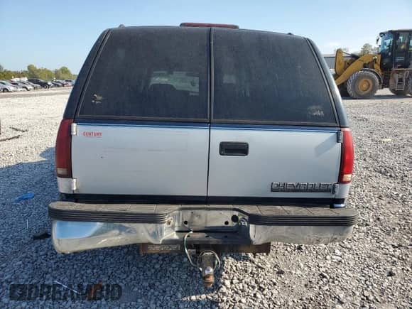 1994 Chevrolet Suburban with VIN 1GNEC16K1RJ410333, listed as a Copart auction lot 84595075 with 311,147 mi miles and Salvage title. Bid and sale history available at DreamBid. Image 6.