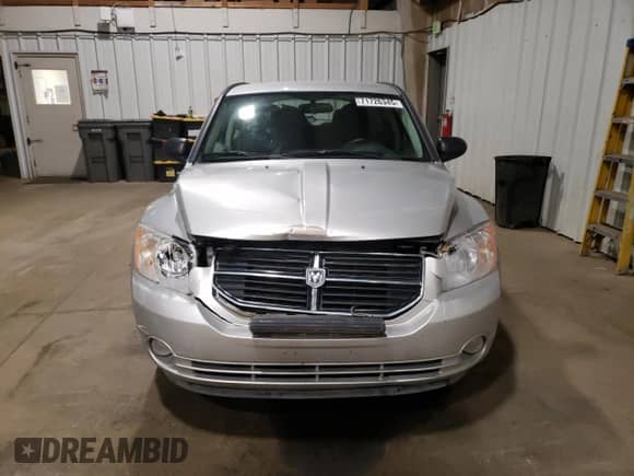 2007 Dodge Caliber R/T with VIN 1B3HE78K67D409143, listed as a Copart auction lot 71726345 with 135,238 mi miles and Salvage title. Bid and sale history available at DreamBid. Image 5.