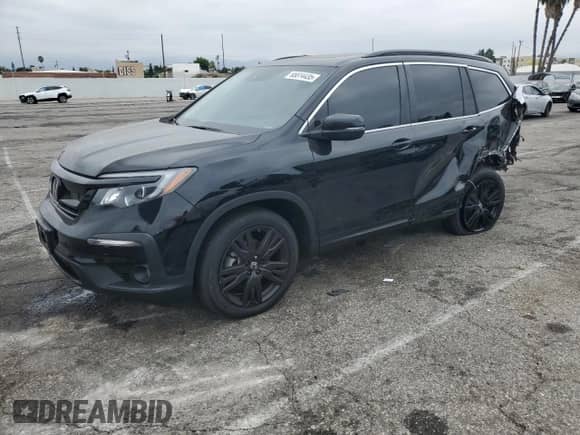 2022 Honda Pilot Special Edition with VIN 5FNYF5H21NB023767, listed as a Copart auction lot 65814435 with 63,461 mi miles and Salvage title. Bid and sale history available at DreamBid. Image 1.