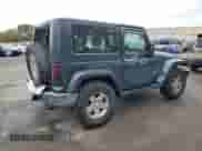2008 Jeep Wrangler Sahara с VIN 1J8FA54128L521036, выставлен на аукционе Copart как лот 86328185 с пробегом 101 540 миль миль и Списание • Salvage title. История ставок и продаж доступна на DreamBid. Изображение 3.