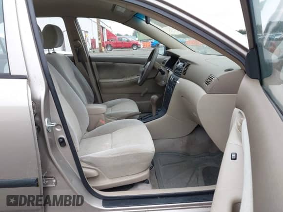 2003 Toyota Corolla CE z VIN 1NXBR32E03Z143788, wystawiony jako IAAI lot #43316766 z przebiegiem 299 999 mil mil oraz . Historia ofert i sprzedaży dostępna na DreamBid. Obrazek 5.