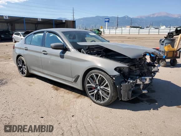 2022 BMW 5 Series 540i xDrive z VIN WBA73BJ01NWX68037, wystawiony jako Copart lot #71298785 z przebiegiem Nie podano mil oraz Szkoda całkowita • Salvage title. Historia ofert i sprzedaży dostępna na DreamBid. Obrazek 4.