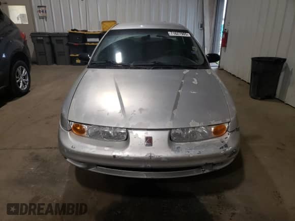 2002 Saturn SL with VIN 1G8ZH52812Z229280, listed as a Copart auction lot 71627905 with 147,279 mi miles and Salvage title. Bid and sale history available at DreamBid. Image 5.
