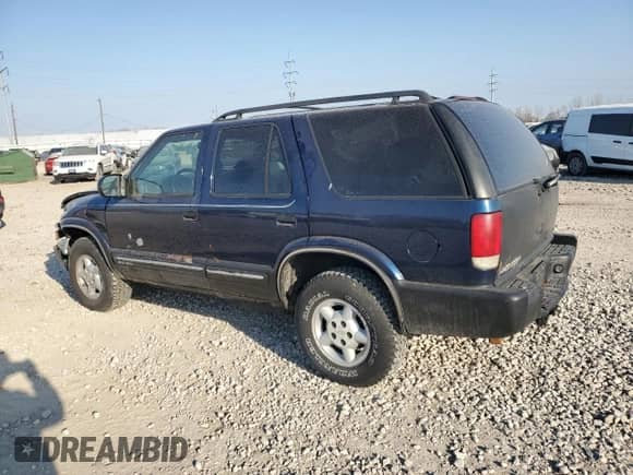 2000 Chevrolet Blazer LT z VIN 1GNDT13W9Y2135306, wystawiony jako Copart lot #47902155 z przebiegiem 152 008 mil mil oraz Szkoda całkowita • Salvage title. Historia ofert i sprzedaży dostępna na DreamBid. Obrazek 2.