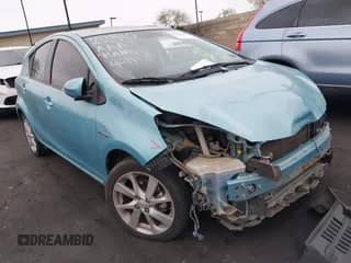 2013 Toyota Prius One z VIN JTDKDTB30D1050905, wystawiony jako IAAI lot #42064158 z przebiegiem 216 000 mil mil oraz . Historia ofert i sprzedaży dostępna na DreamBid. Obrazek 1.