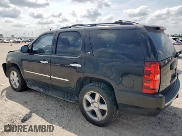 2011 Chevrolet Tahoe LTZ с VIN 1GNSCCE04BR386485, выставлен на аукционе Copart как лот 70738925 с пробегом 105 001 миль миль и Списание • Salvage title. История ставок и продаж доступна на DreamBid. Изображение 2.