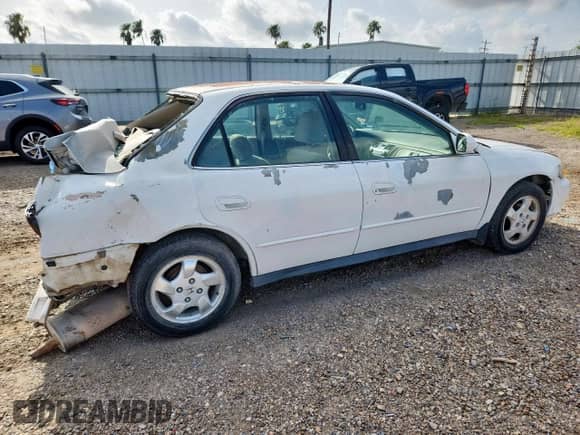 2002 Honda Accord LX с VIN 3HGCG56452G704808, выставлен на аукционе Copart как лот 64263135 с пробегом Не указан миль и Списание • Salvage title. История ставок и продаж доступна на DreamBid. Изображение 3.