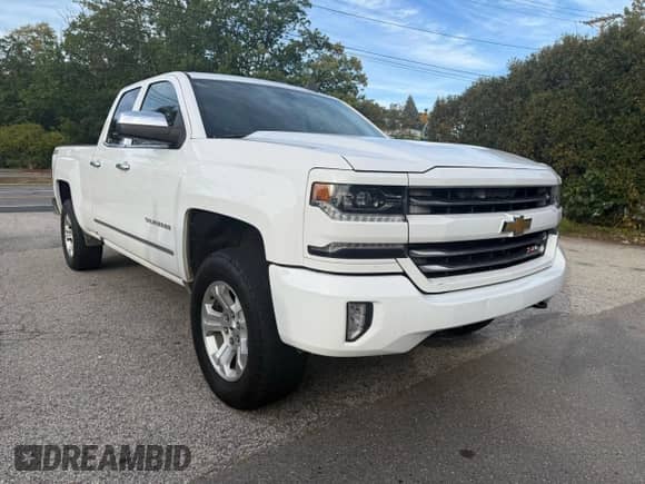 2016 Chevrolet Silverado 1500 LTZ с VIN 1GCVKSEC2GZ373318, выставлен на аукционе Copart как лот 84875495 с пробегом 241 412 миль миль и Чистый • Clean title. История ставок и продаж доступна на DreamBid. Изображение 1.