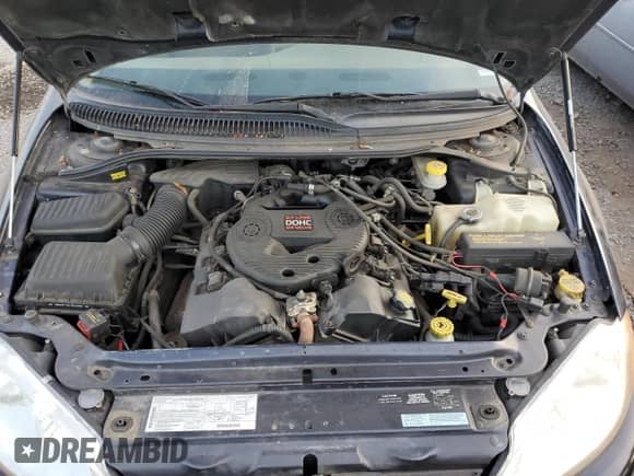 2000 Dodge Intrepid z VIN 2B3HD46R0YH433377, wystawiony jako Copart lot #79120734 z przebiegiem 90 783 mil mil oraz Szkoda całkowita • Salvage title. Historia ofert i sprzedaży dostępna na DreamBid. Obrazek 11.