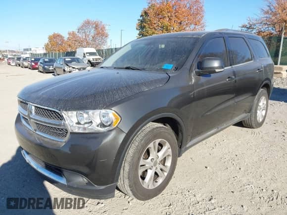 2011 Dodge Durango Crew z VIN 1D4RE4GGXBC700065, wystawiony jako IAAI lot #43555396 z przebiegiem 183 621 mil mil oraz . Historia ofert i sprzedaży dostępna na DreamBid. Obrazek 17.