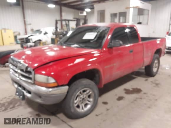 2001 Dodge Dakota Sport с VIN 1B7GG22N81S348763, выставлен на аукционе IAAI как лот 41566847 с пробегом 290 298 миль миль и . История ставок и продаж доступна на DreamBid. Изображение 2.
