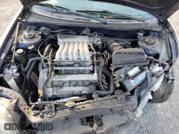 2003 Hyundai Tiburon GT with VIN KMHHN65F23U059936, listed as a Copart auction lot 79432444 with Not provided miles and Salvage title. Bid and sale history available at DreamBid. Image 12.