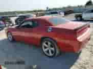 2012 Dodge Challenger SXT z VIN 2C3CDYAGXCH176831, wystawiony jako Copart lot #70942105 z przebiegiem 156 131 mil mil oraz Szkoda całkowita • Salvage title. Historia ofert i sprzedaży dostępna na DreamBid. Obrazek 2.